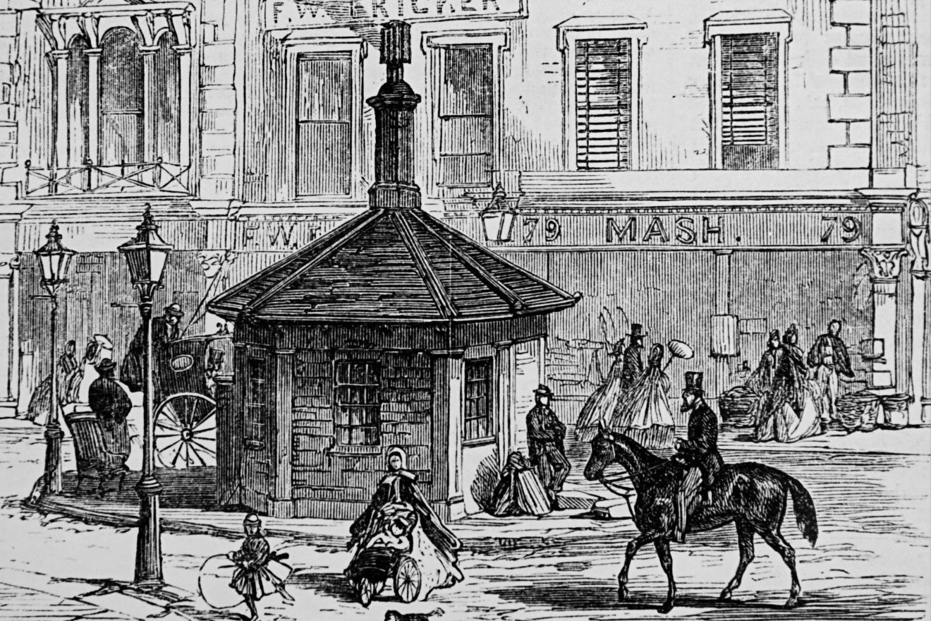 Victorian-era engraving of a London street scene with an octagonal kiosk, horse rider, pedestrians in period dress, and gas lamps